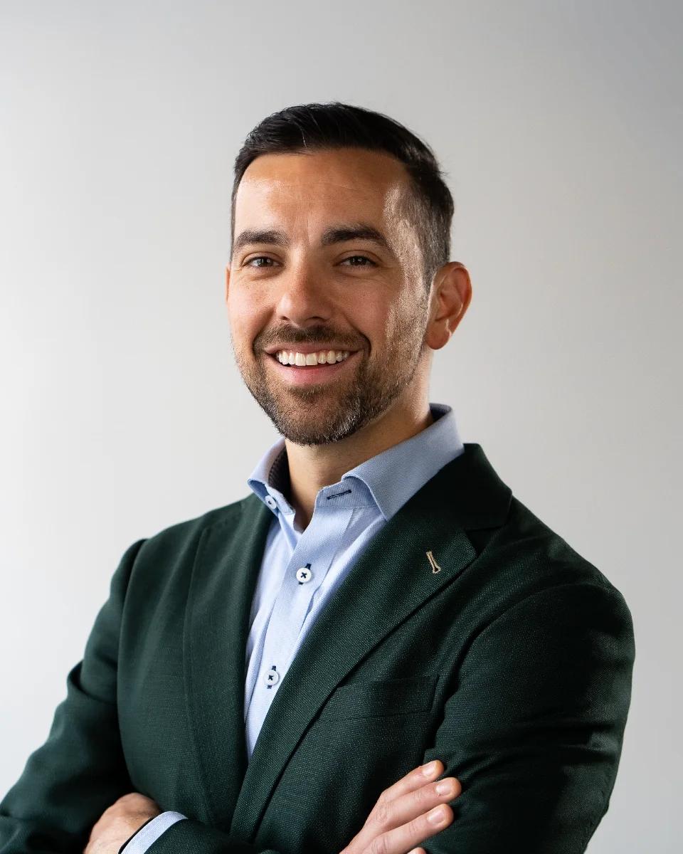 Chris Porpiglia, CFP®, founder of Wright Park Wealth, smiling with his arms crossed